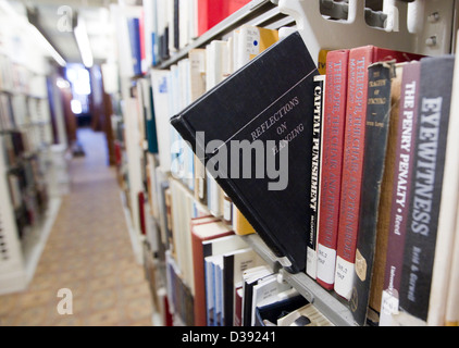 Rows of hardcover books on shelves at the Legislative Reference Library of Texas inside the Texas capitol building in Austin Stock Photo
