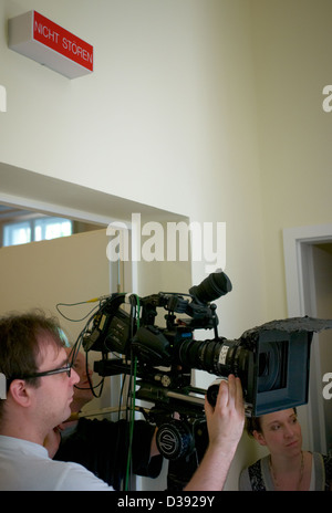 Berlin, Germany, cameraman and assistant during the filming of a student film Stock Photo