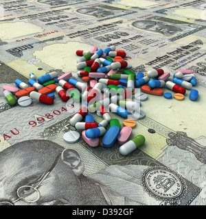 Illustrative image of pills above Indian currencies representing health cost Stock Photo