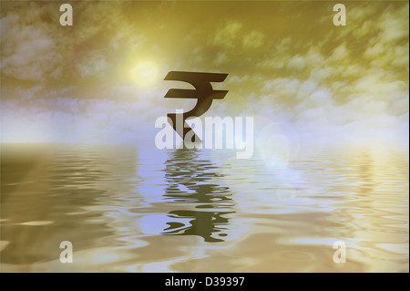 Indian rupee symbol floating on water Stock Photo