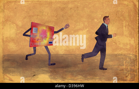 Exhausted businessman running away from credit card Stock Photo