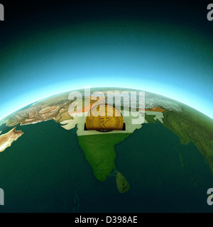 Golden Rupee coin on globe enlightening India representing investment Stock Photo