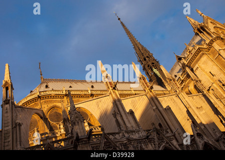 Sunrise against the Gothic architecture of Cathedral Notre Dame, Paris France Stock Photo