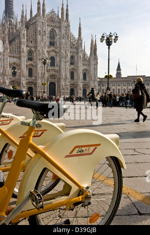 Milan Cathedral and Bike Mi bikes rental system Piazza Duomo Milan Lombardy Italy Europe Stock Photo