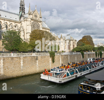 Bateau Mouche on River Seine by Notre Dame Cathedral Paris France Europe Stock Photo