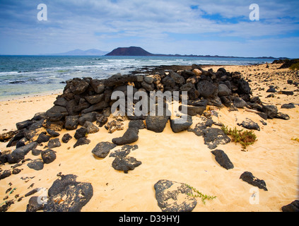 fuerteventura, Canary islands, Spain, beach sand blue sky, Parque Natural de Las Dunas de Corralejo, Lobos island in distance Stock Photo