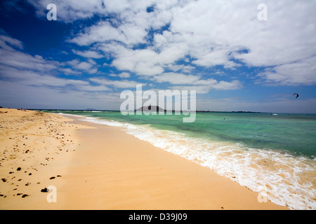 fuerteventura, Canary islands, Spain, beach sand blue sky, Parque Natural de Las Dunas de Corralejo, Lobos island in distance Stock Photo