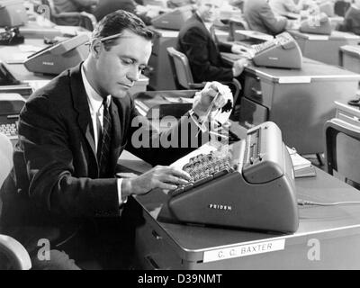 (dpa) - C. C. Baxter (Jack Lemmon) working at a type writer in Billy Wilder's comedy 'The Apartment' (1960). Billy Wilder died on 28 March 2002 at the age of 95 in his home in Beverly Hills. After starting his career in Berlin he emigrated to the United States in 1933 and went down in film history w Stock Photo