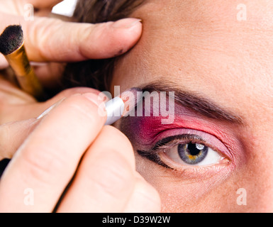 make up artist applying make up on actress Stock Photo