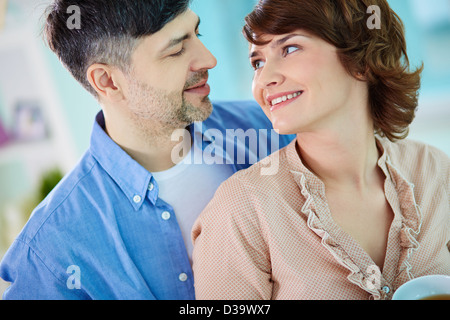 Portrait of happy middle aged couple looking at one another Stock Photo