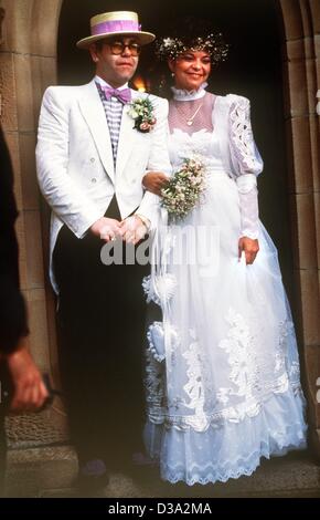 (dpa) - British pop musician Elton John and his newly wed wife, German sound technician Renate Blauel, pictured after their wedding in Sydney, 14 February 1984. Stock Photo