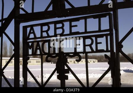 (dpa files) - A view of the former main entrance to the former concentration camp in Dachau, Germany, 27 January 2000. The inscription on the iron gate reads: 'Arbeit macht frei' (Work makes you free). Dachau was the first Nazi concentration camp, established on 22 March 1933, just a few weeks after Stock Photo