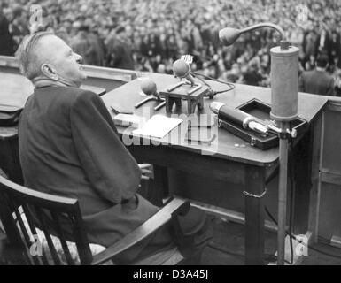 (dpa files) - An undated file picture shows Kurt Schumacher , chairman of the German Social Democratic party (SPD), as he sits on the podium during a rally. Between the World Wars he was an editor. In May 1946 he was elected as the first chairman of the SPD. During the World War I Schumacher lost hi Stock Photo