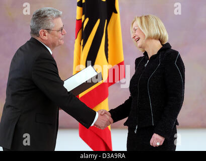 German President Joachim Gauck presents the certificate of appointment to new Education Minister Johanna Wanka (R) at Bellevue Palace in Berlin, Germany, 14 February 2013. Photo: WOLFGANG KUMM Stock Photo