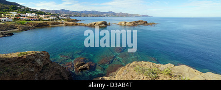 Coastal panorama over blue waters of the Mediterranean sea in Llança, Costa Brava, Catalonia, Spain Stock Photo