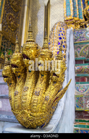 Wat Phra Kaew temple in Bangkok, Thailand (Grand Palace) - Five headed snake god detail Stock Photo