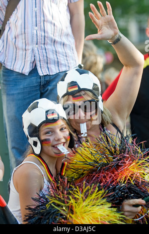 Berlin, Germany, Mother and Daughter with Soccer hats celebrate the second round victory Stock Photo