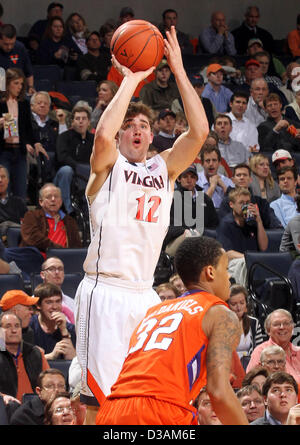 Feb. 7, 2013 - Charlottesville, Va, USA - Virginia guard Joe Harris (12) shoots over Clemson forward K.J. McDaniels (32) during the game against Clemson Thursday in Charlottesville, VA. Virginia defeated Clemson 78-41. (Credit Image: © Andrew Shurtleff/ZUMAPRESS.com) Stock Photo