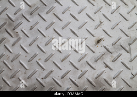 checker plate floor surface texture steel grip metal grating Stock Photo