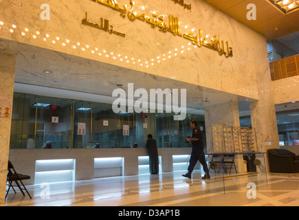 teller windows at Central Bank of Kuwait, Kuwait City, Kuwait Stock Photo