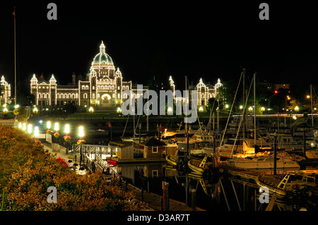 Inner harbour harbor lit up illuminate illuminated night nighttime lights lighting victoria vancouver island canada parliament Stock Photo