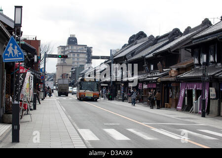 February 14, 2013, Kawagoe, Japan - Tourist visit the stores along the main street of Little Edo, Kawagoe. An old town from Edo Period (1603-1867) is located in Kawagoe, 30 minutes by train from central Tokyo. In the past Kawagoe was an important city for trade and strategic purpose, the shogun installed some of their most important loyal men as lords of Kawagoe Castle. Every year 'Kawagoe Festival' is held in the third weekend of October, people pull portable shrine during the parade, later 'dashi' floats on the streets nearby. The festival started 360 years ago supported by Nobutsuna Matsuda Stock Photo