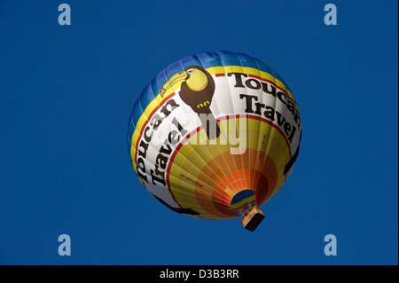 A hot air balloon flies over Hampshire in England Stock Photo
