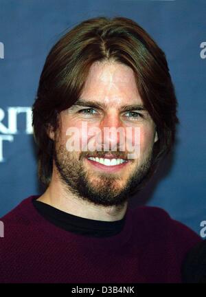 (dpa) - US actor Tom Cruise smiles during a press conference in Berlin, 26 September 2002. He came to Berlin to present his new movie, 'Minority Report', which premieres in Berlin. In the film Cruise plays a cop in the future working in a division of the police department that arrests killers before Stock Photo