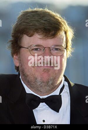 (dpa) - US director Michael Moore, pictured at the 55th International Film Festival in Cannes, France, 26 May 2002. Moore received the Special Anniversary Award for his documentary 'Bowling for Columbine'. Stock Photo