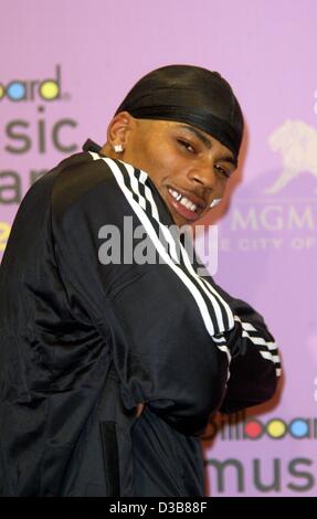 The rap star Nelly poses for the cameras after the 'Billboard Awards' ceremony in Las Vegas on 9 December 2002. Stock Photo