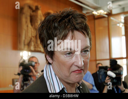 (dpa) - Federal Minister of Justice Brigitte Zypries looks curious prior to the Federal Constitutional Court's proclamation of sentence in Karlsruhe, Germany, Monday 18 July 2005. According to the 2nd senate of the Federal Constitutional Court the German law concerning the European arrest warrant is Stock Photo