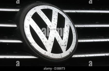 (dpa) - The picture, dated 01 July 2005, shows the logo of the car manufacturer Volkswagen in front of the company's branch in Hamburg, Germany. Europes biggest car maker is faced with broadening accusations of bribe money payments. Chairman of VW works council Klaus Volkert resigned all of a sudden Stock Photo