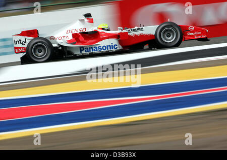 (dpa) - German Formula One driver Ralf Schumacher of Toyota is pictured in action during the practice session at the Silverstone circuit, UK, Saturday, 09 July 2005. The British Grand Prix will take place at the Silverstone circuit on Sunday, 10 July. Stock Photo