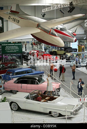 (dpa) - The picture shows visitors at the Automobile and Technology Museum in Sinsheim, Germany, 06 July 2005. The museum shows over 3,000 exhibits situated on an area of over 30.000 sqm indoors. Amongst others, it features a supersonic transport Concorde and a Russian Tupolev 144 in open-air ground Stock Photo