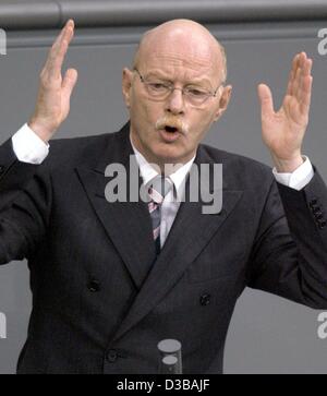 (dpa) - German Defence Minister Peter Struck, then chairman of the parliamentary faction of the German Social Democrat Party SPD, gestures during his speech in the plenum of the Bundestag in Berlin, 28 November 2001. Struck, who serves as Defence Minister since 25 July 2002, is to continue his work  Stock Photo