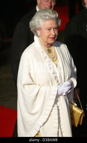 (dpa) - Queen Elizabeth II and her husband Prince Philip (covered) arrive at the world premiere of the new James Bond movie 'Die Another Day' in London, 18 November 2002. The premiere took part in the Royal Albert Hall and was attended by an array of stars and the Queen. Stock Photo