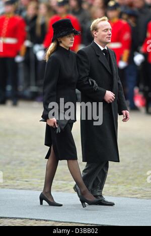 (dpa) - Mabel Wisse-Smit, girlfriend of the Dutch Prince Johan Friso, and Carlos of Bourbon-Parma, son of Queen Beatrix's sister, Princess Irene and her divorced husband Carlos Hugo of Bourbon-Parma, arrive at the Nieuwe Kerk (new church) in Delft to attend the funeral service for Prince Claus of th Stock Photo
