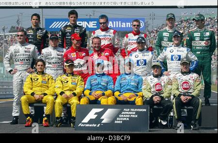 (dpa) - The formula one drivers pose for a group photo ahead of the Grand Prize of Japan on the racing court in Suzuka, Japan, 13 October 2002: back row (L-R:)  Alex Yoong, Mark Webber (both Minardi), Mika Salo, Allan McNish (both Toyota), Eddie Irvine, Pedro de la Rosa (both Jaguar); second row (L- Stock Photo