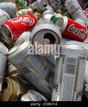 (dpa) - Empty beverage cans lie in a container in Potsdam, Germany, 12 June 2003. The introduction of a deposit on cans and one-way containers on 1 January have led to a massive decrease of sales of beer cans this year. Some beer breweries reported a drop of up to 80 per cent of sales of beer cans.  Stock Photo