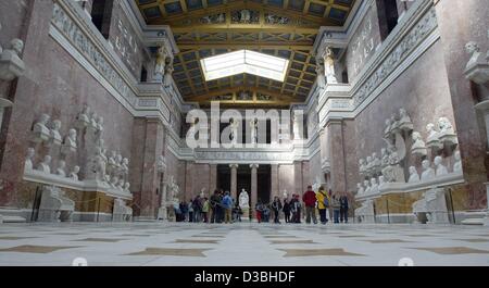 (dpa) - A visitor group stand in front of the Walhalla, the commemoration hall for outstanding personalities of German culture, near Donaustauf, Germany, 8 April 2003. The temple features six large groups of busts. At their centre is always one of the Germanic goddess of victory. In the upper parts, Stock Photo