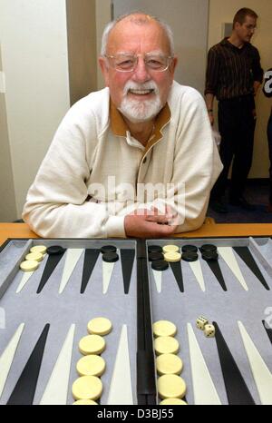 (dpa) - The British singer and entertainer Roger Whittaker relaxes before his concert by playing backgammon, Suhl, Germany, 23 April 2003. The 67-year-old will tour Germany and Austria and present his new album 'mehr denn je' (more than ever). Stock Photo