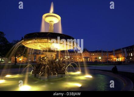 (dpa) - The fountain in front of the Stuttgart Castle is illuminated by night, in Stuttgart, Germany, 31 March 2003. The fountain was built in 1863 in front of the Neues Schloss (new castle). Stock Photo