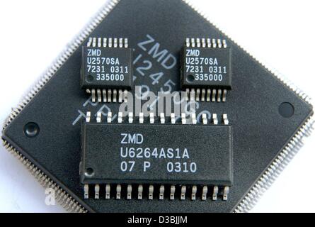 (dpa) - Standard circuits for computer chips of the chip manufacturer ZMD (Zentrum Mikroelektronik Dresden) are pictured in Dresden, Germany, 25 March 2003. ZMD mainly produces integrated circuits for automotive and industrial electronics, for medical technics and for infrared transmission as used i Stock Photo