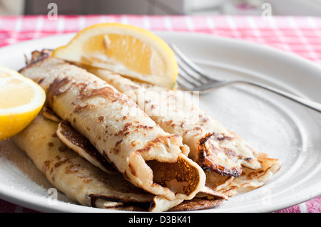 Fresh pancakes with lemon and sugar Stock Photo