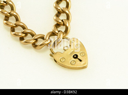 Gold heart on a chain Stock Photo