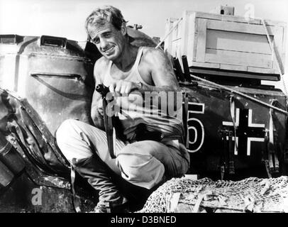 (dpa files) - French actor Jean-Paul Belmondo pictured in a movie scene as Sergeant Pierre Augagneur in 'Les Morfalous' (the glorious), 1983. He will celebrate his 70th birthday on 9 April 2003. Belmondo was born as the son of a renowned sculptor whose wife was a painter in Neuilly-sur-Seine, France Stock Photo