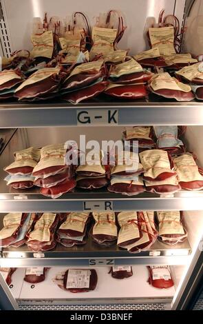 (dpa) - Blood conserves are stored in a refrigerator at the Red Cross in Munich, Germany, 2 April 2003. After a three-year recession of blood donations the number rose by 5,000 to 507,600 in Bavaria in 2002. Stock Photo