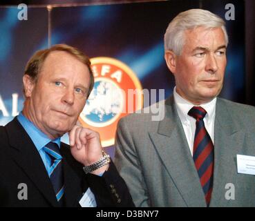 (dpa) - Berti Vogts (L), the coach of the Scottish soccer team, and Henk Kessler, director of professional soccer of the Dutch soccer federation, are pictured after the drawings of the play-off games of the qualification for the European Soccer Championships 2004 in Portugal, in Frankfurt, Germany,  Stock Photo