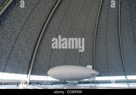 (dpa) - A sold airship stands in the factory of the former CargoLifter group in Briesen-Brand, northern Germany, 1 October 2003. The remaining assets of the insolvent airship constructor will be auctioned off between 8 and 11 October. Under the hammer will be office furniture, flight technology and  Stock Photo