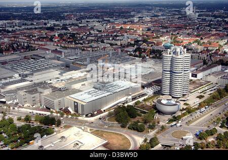 (dpa) - A view of the headquarters of the car-maker Bayerische Motoren Werke (Bavarian motor works, BMW), a tower in the shape of four cyclinders, in Munich, 2 September 2003. Stock Photo